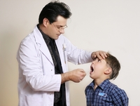 Doctor_assessing_young_boy