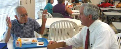 An El Paso senior sits with Senator Shapleigh